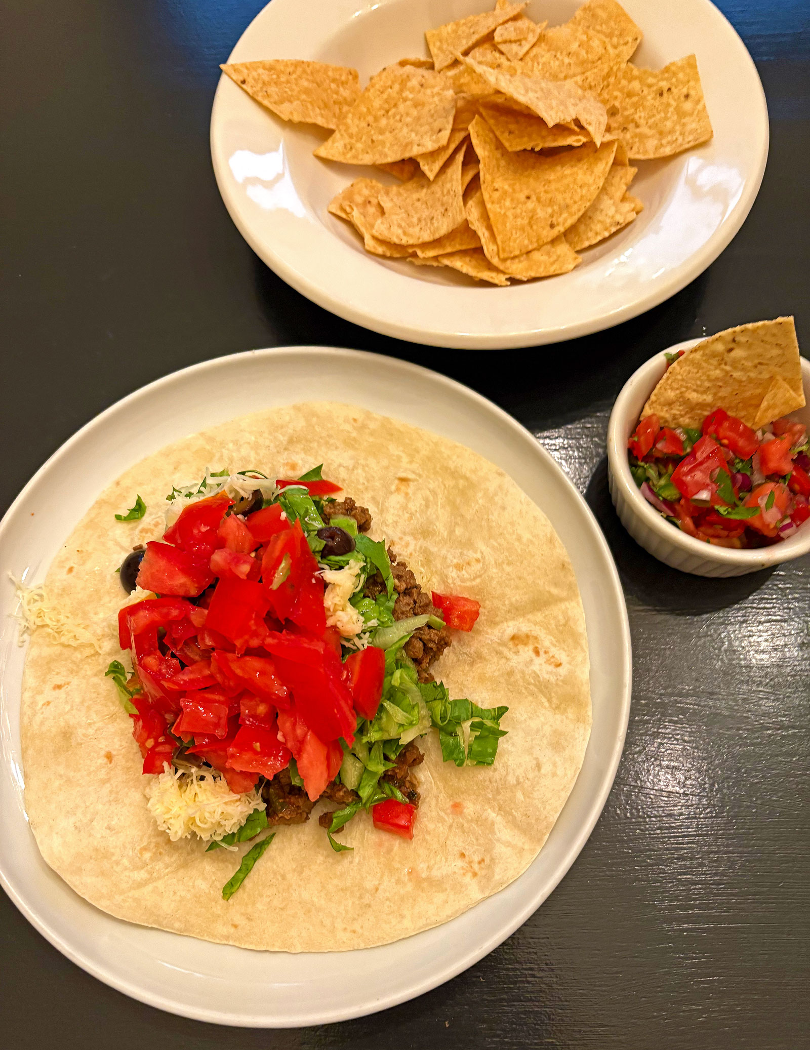 Ground meat tacos, with pico de gallo.